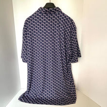 Load image into Gallery viewer, Navy blue dress with white floral pattern on a mannequin against a white background