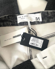 Load image into Gallery viewer, Close-up of a garment's inner waistband area showing a black-and-white patterned fabric, white labels reading 'rag &amp; bone' and 'MIRIAM', and a black product tag.