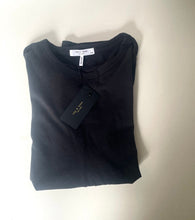 Load image into Gallery viewer, Folded navy blue shirt with a tag on a light gray background