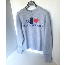 Load image into Gallery viewer, Gray sweatshirt with 'I ❤️ New York City' text on a hanger against a white background