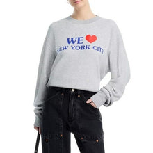Load image into Gallery viewer, Person wearing a gray sweatshirt with 'WE ♥ NEW YORK CITY' text on a white background