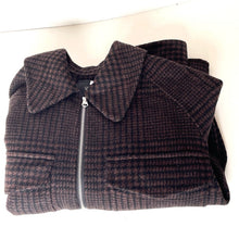 Load image into Gallery viewer, Folded brown plaid jacket with a zipper on a white background