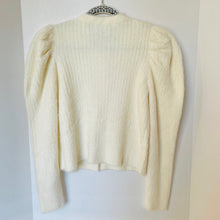 Load image into Gallery viewer, Cream-colored sweater on a hanger against a white background