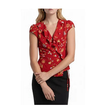 Load image into Gallery viewer, Red floral blouse worn by a person on a white background