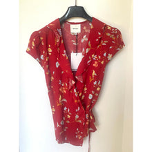Load image into Gallery viewer, Red floral dress on a hanger against a white background