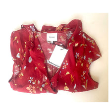 Load image into Gallery viewer, Red floral blouse with a visible brand tag on a white background