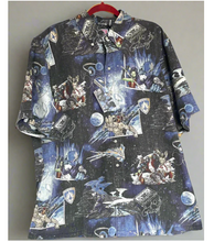Load image into Gallery viewer, Shirt with space-themed print on a plain background