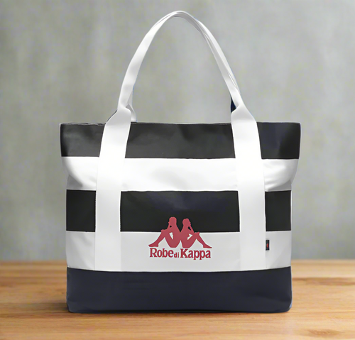 Black and white tote bag with a red logo on a white background