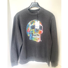 Load image into Gallery viewer, Gray sweatshirt with a colorful skull design on a hanger against a white background