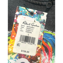 Load image into Gallery viewer, Colorful clothing tag with product details on a gray garment