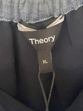 Load image into Gallery viewer, Close-up of a Theory label on a garment with 'XL' size tag.