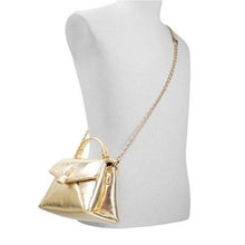 Load image into Gallery viewer, Gold handbag with chain strap on a mannequin bust against a white background