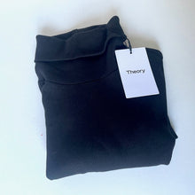 Load image into Gallery viewer, Folded black garment with a &#39;Theory&#39; tag on a white background