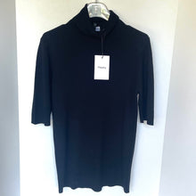 Load image into Gallery viewer, Black turtleneck dress on a hanger with a &#39;Theory&#39; tag against a white background
