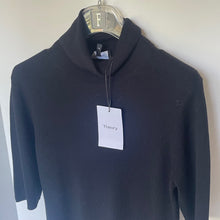 Load image into Gallery viewer, Black turtleneck sweater on a hanger with &#39;Theory&#39; tag against a white background