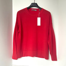 Load image into Gallery viewer, Red sweater on a hanger with a tag against a white background