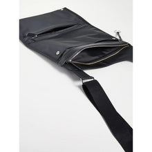 Load image into Gallery viewer, Black leather crossbody bag with a strap on a white background 0