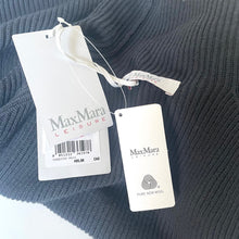 Load image into Gallery viewer, Max Mara Leisure clothing tag on a textured fabric background