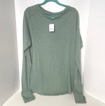 Load image into Gallery viewer, Green long-sleeve shirt on a hanger with a white background