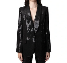 Load image into Gallery viewer, Black sequin blazer worn by a person on a white background