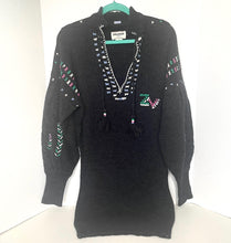 Load image into Gallery viewer, Black sweater with colorful patterns on a white background