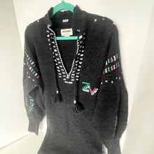 Load image into Gallery viewer, Dark gray cardigan with colorful patterns on a white background