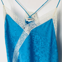 Load image into Gallery viewer, Blue lace-trimmed dress with a tag on a white background