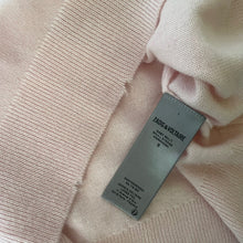 Load image into Gallery viewer, Close-up of a Zadig &amp; Voltaire label on a pink garment.
