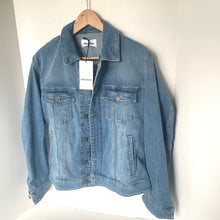 Load image into Gallery viewer, Blue denim jacket on a hanger against a white background