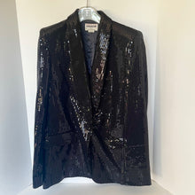 Load image into Gallery viewer, Black sequin blazer on a hanger against a white background