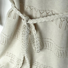 Load image into Gallery viewer, Close-up of a textured fabric with braided drawstring