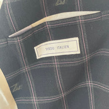 Load image into Gallery viewer, Plaid fabric with 'Tissu Italien' label and brand logo on a dark background