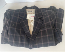 Load image into Gallery viewer, Folded dark gray checkered shirt with a brand label on a white background