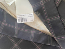 Load image into Gallery viewer, Close-up of a dark gray fabric with pink stitching and a visible label.