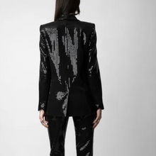 Load image into Gallery viewer, Black sequin blazer worn by a person on a white background