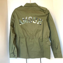 Load image into Gallery viewer, Green jacket with 'AMOUR' text on the back against a white background