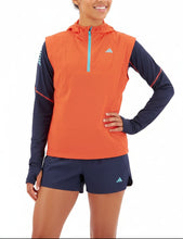 Load image into Gallery viewer, Woman wearing an orange and navy athletic outfit with Adidas logo on a white background