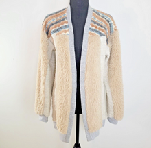 Load image into Gallery viewer, Beige cardigan with colorful pattern on a mannequin against a white background