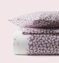 Load image into Gallery viewer, Floral patterned bedding set with a pillow on a light pink background