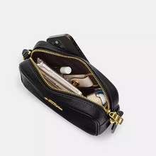 Load image into Gallery viewer, Black leather pouch with gold zipper on a white background