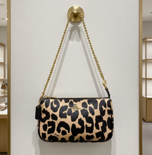Load image into Gallery viewer, Leopard print handbag with gold chain strap on a white background