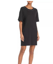 Load image into Gallery viewer, Black dress with studded neckline worn by a model on a white background