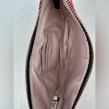 Load image into Gallery viewer, Close-up of a pink bag with a zipper on a light gray background