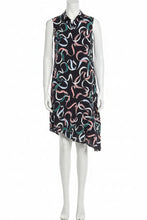 Load image into Gallery viewer, Woman wearing a sleeveless dress with abstract pattern on a white background
