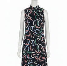 Load image into Gallery viewer, Mannequin wearing a sleeveless dress with a colorful abstract pattern on a white background