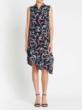 Load image into Gallery viewer, Woman wearing a sleeveless dress with abstract pattern on a white background
