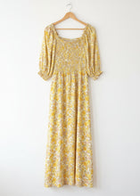 Load image into Gallery viewer, Yellow floral dress on a mannequin against a white background