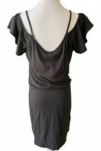 Load image into Gallery viewer, A dark gray short-sleeve slip dress with thin spaghetti straps and a draped, gathered waist, displayed on a white mannequin torso against a beige wall.