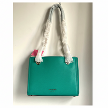 Load image into Gallery viewer, Teal handbag with a white lace scarf draped over it on a light background