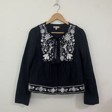 Load image into Gallery viewer, Black embroidered jacket on a mannequin against a plain background